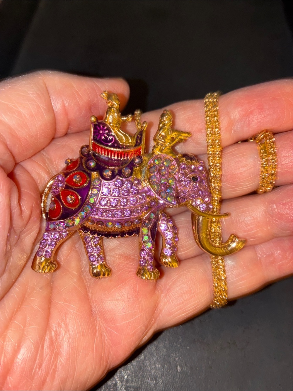 Elephant Pendant Necklace with Purple and Red Accents Two Men on the Elephant